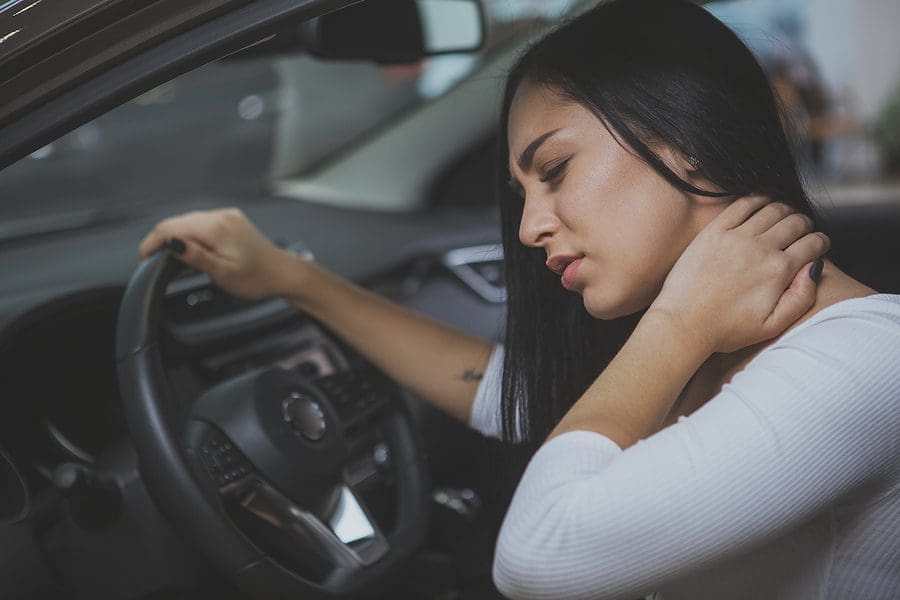 Woman Rubbing Her Neck