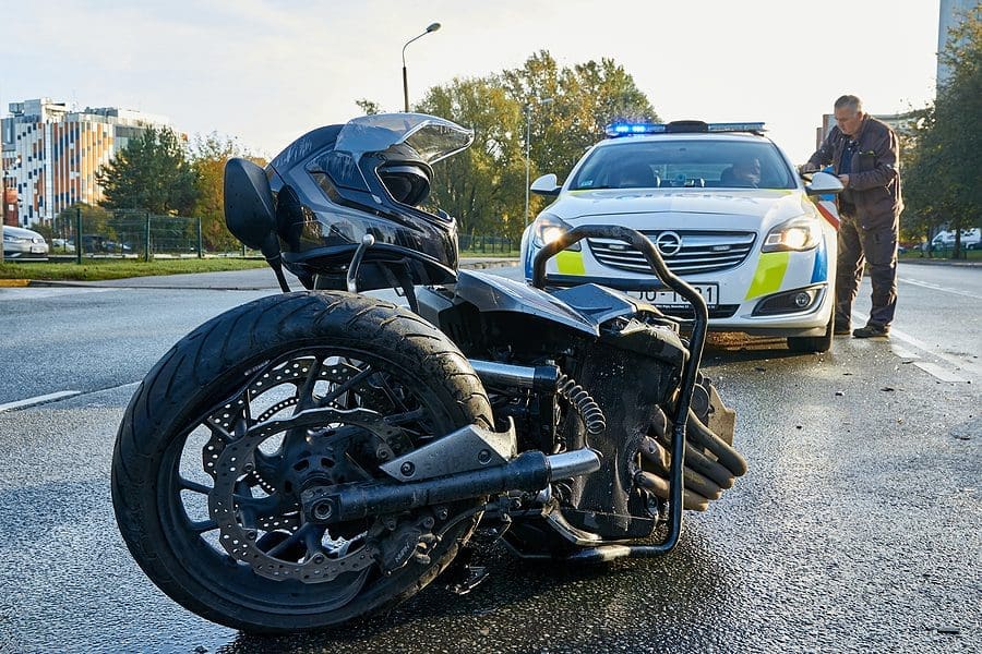 motorbike on the city road at the scene of an accident