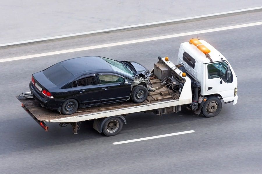 Truck Towing Car