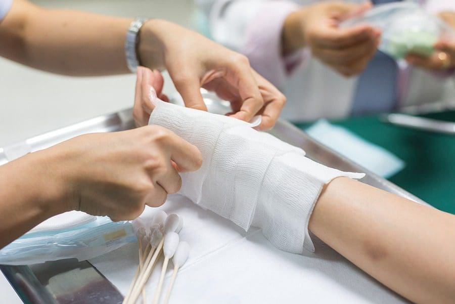 nurse treating patient