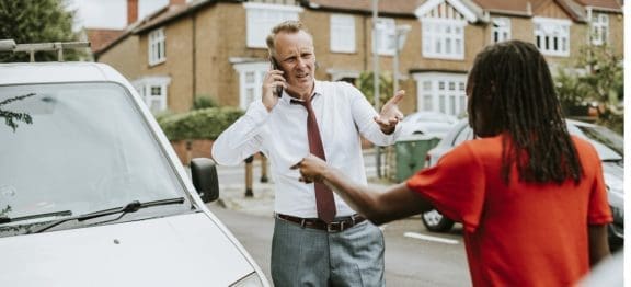 people arguing after accident