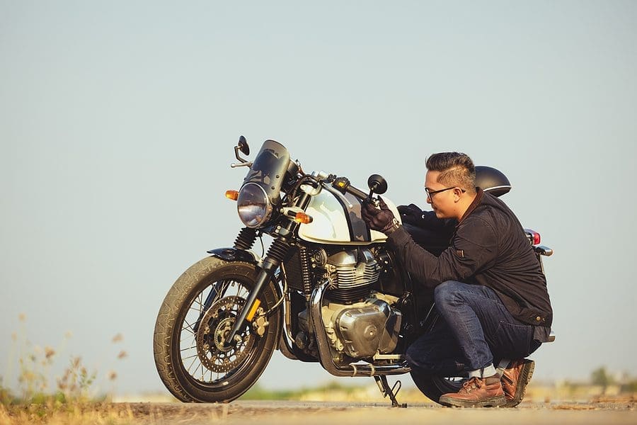 man fixing bike